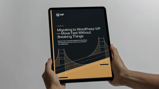 A person holds a tablet displaying a digital guide titled “Migrating to WordPress VIP — Move Fast Without Breaking Things.” The cover features a stylized gold and white illustration of a suspension bridge on a dark gray background, with the WordPress VIP logo at the top. The layout conveys reliability, connection, and technical sophistication, symbolizing seamless migration and stability.
