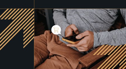 Person using smartphone for ecommerce content with shopping cart icon, representing digital solution integration.