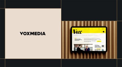 Tablet displaying the Vox Media website homepage with bold yellow branding, placed on a ribbed beige background, highlighting Vox Media’s digital presence.