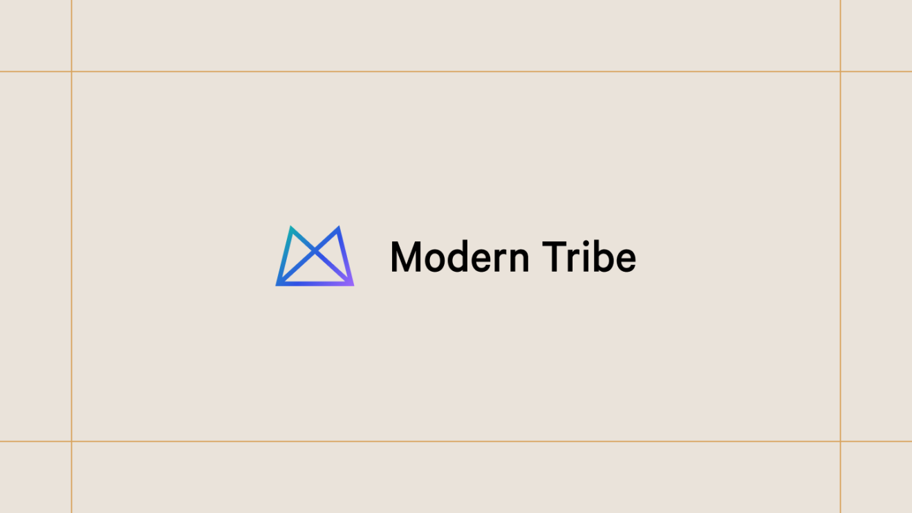 Modern Tribe logo on a cream background, framed by thin gold lines.