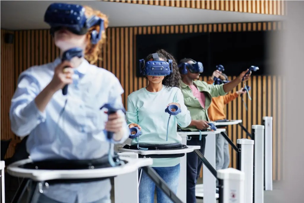 People using VR headsets to engage with a digital solution's immersive content experience.