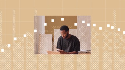 A man looking at a Parse.ly MCP data chart overlaid on his phone in a creative workspace.