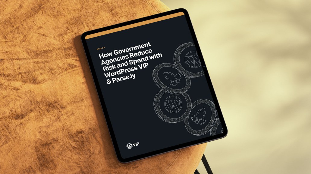 Tablet on a warm-toned surface displaying the cover of an ebook titled “How Government Agencies Reduce Risk and Spend with WordPress VIP & Parse.ly,” featuring coin illustrations with WordPress and Parse.ly logos on a dark background.