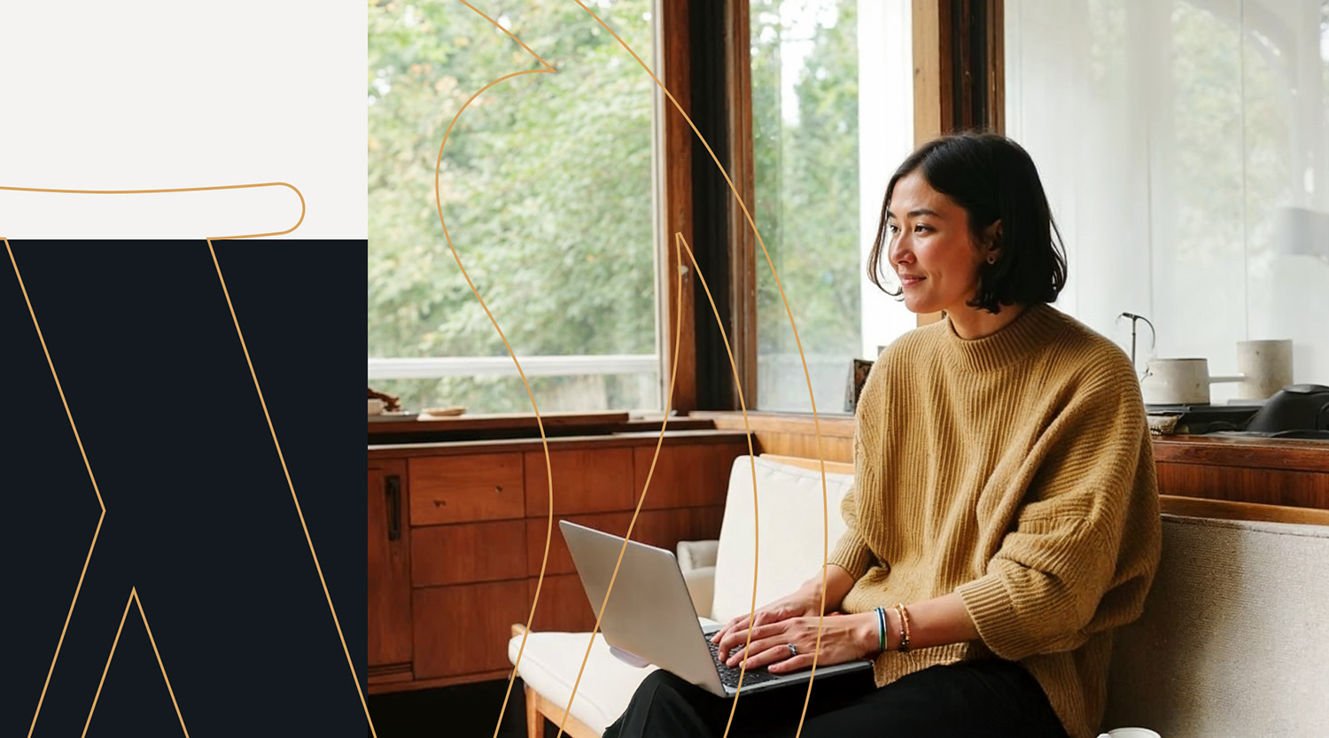 A woman in a cozy tan sweater sits on a modern bench, smiling while working on her laptop in a sunlit room with large windows and wooden interiors. WordPress gold logo line graphics overlay the image, adding a creative and dynamic design element.
